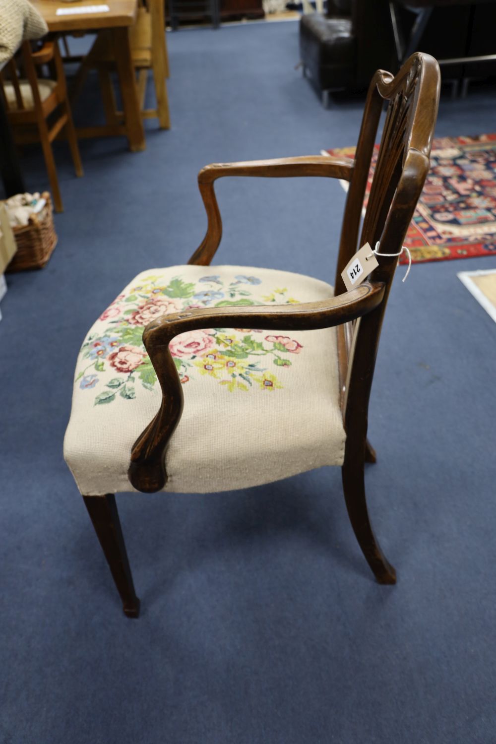 A pair of Hepplewhite style mahogany open armchairs